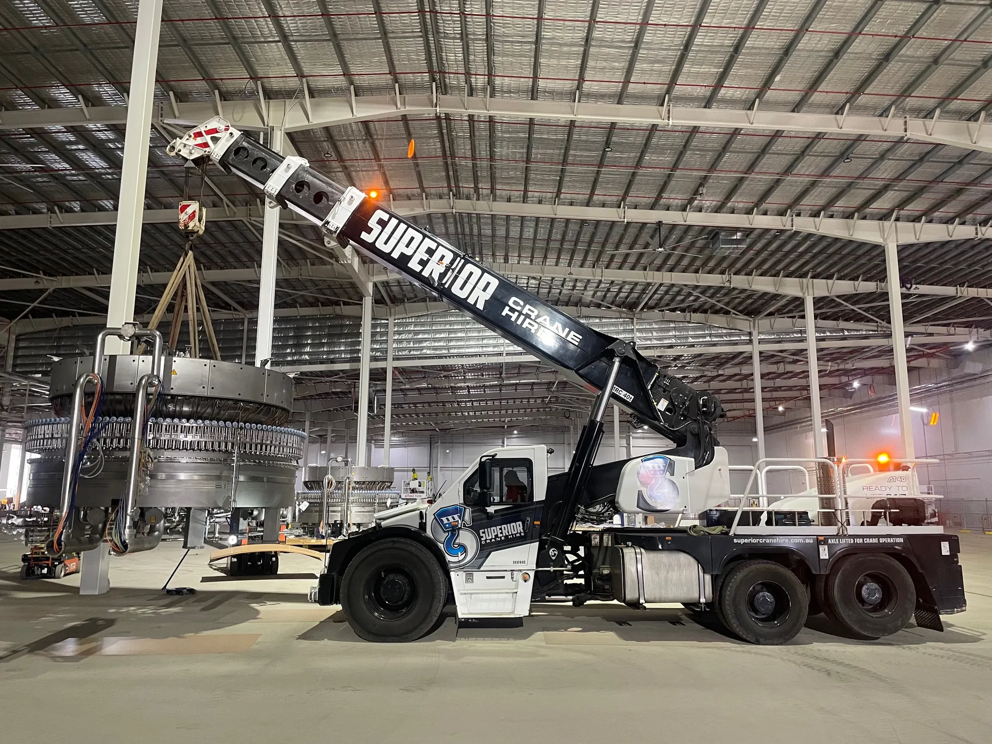 Superior Franna crane inside a large warehouse build