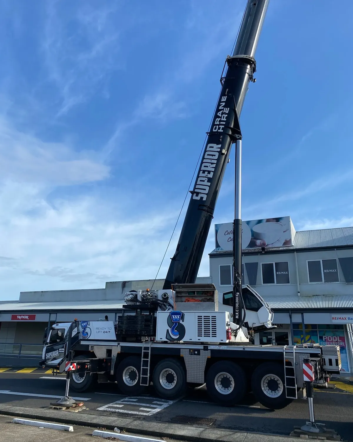 Superior all-terrain crane set up in a street